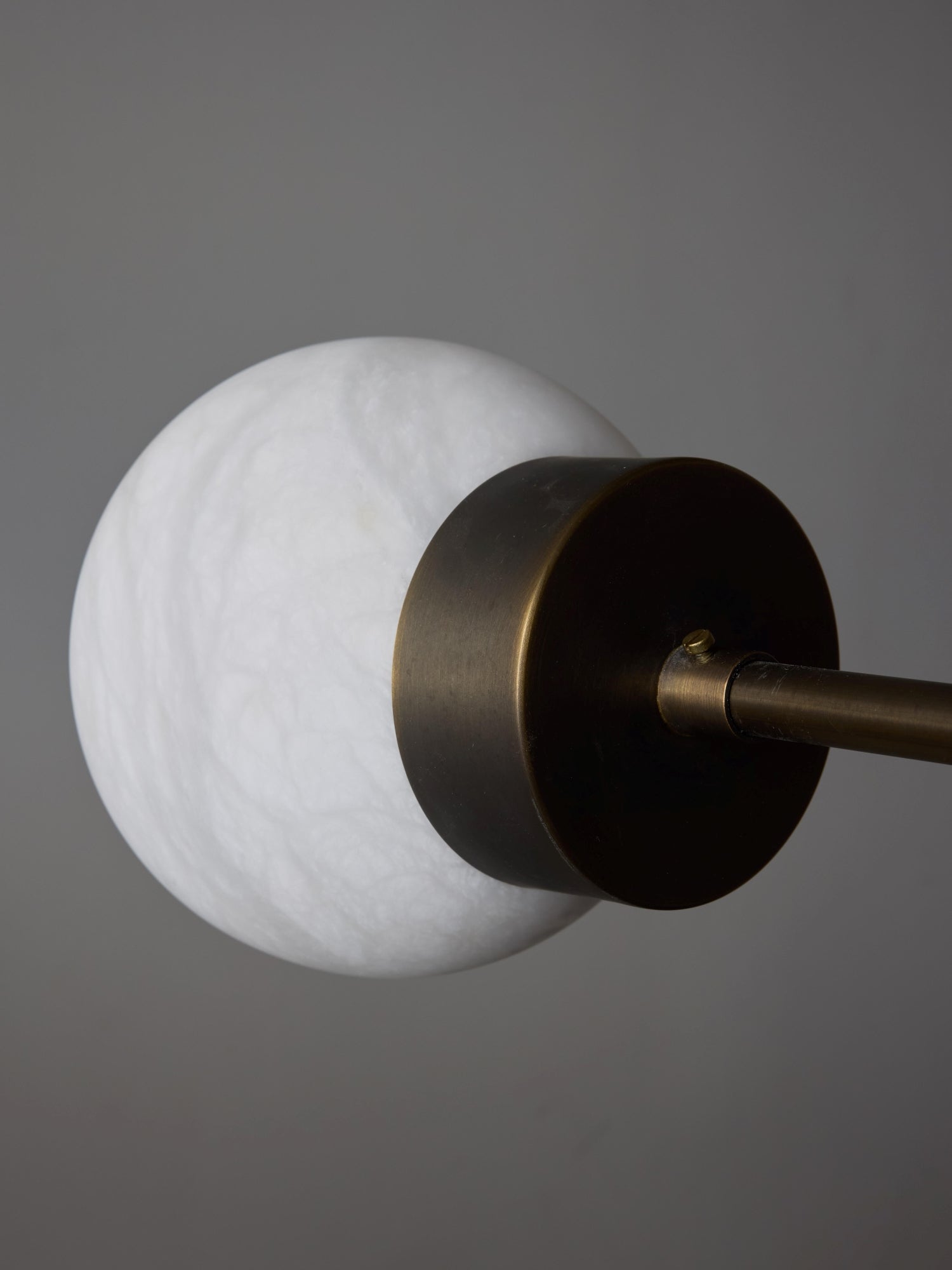 Brass and Alabaster Globes Asymmetrical Line Chandelier