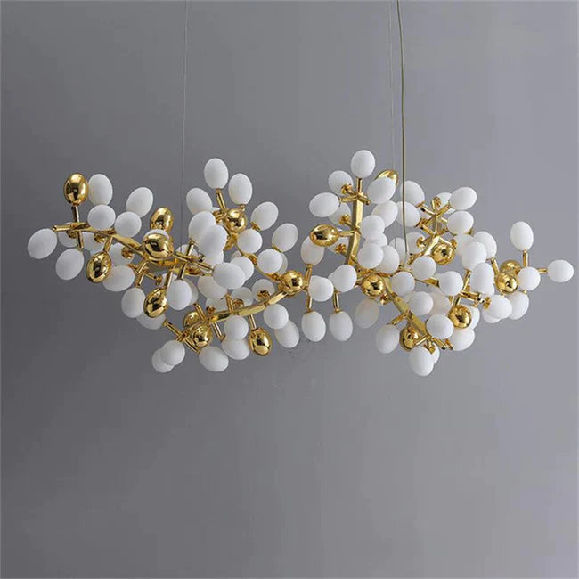 Post Modern Linear Grape Branch Chandelier Over Dining Table
